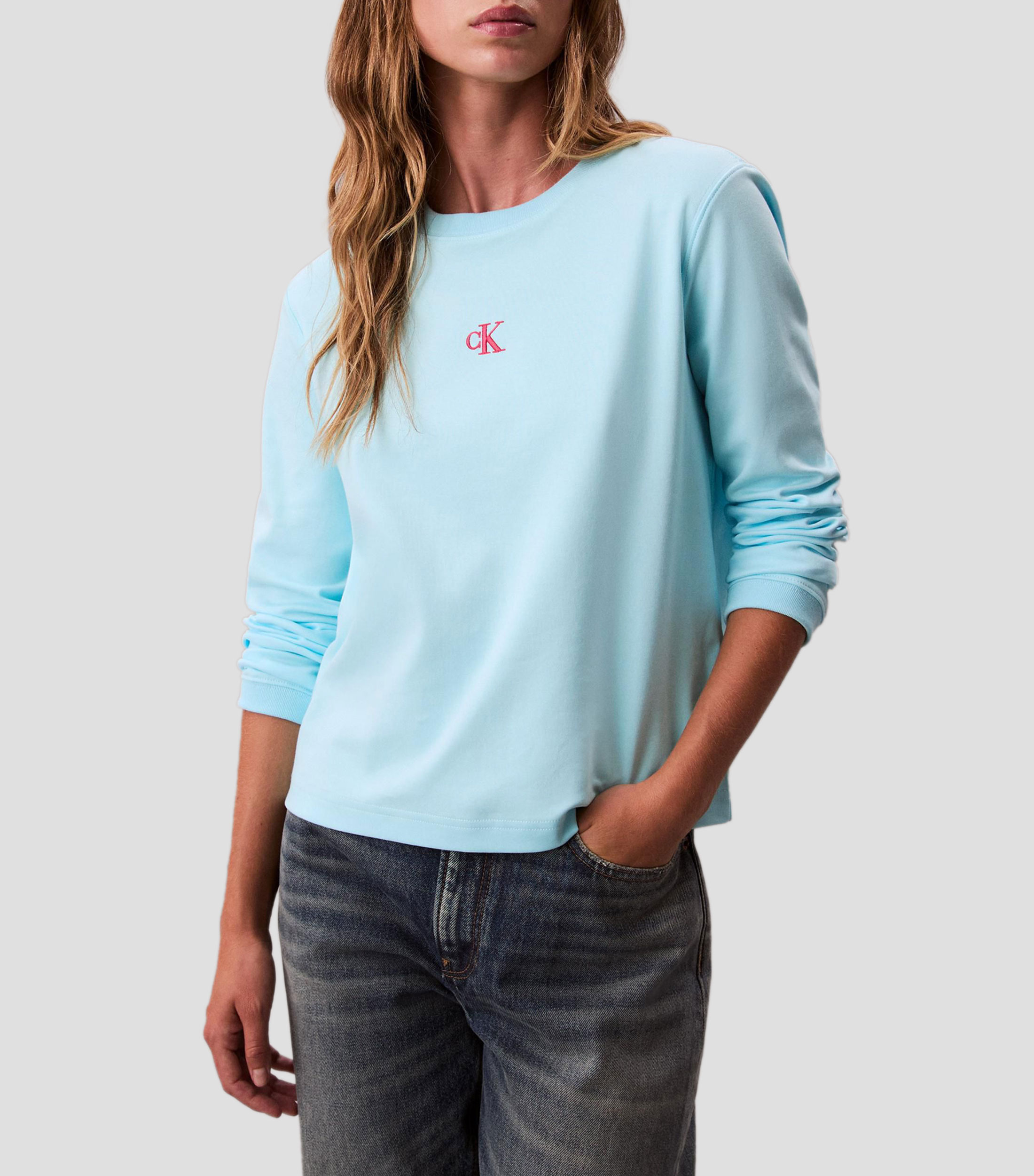 Playera de cuello redondo manga larga lisa Mujer